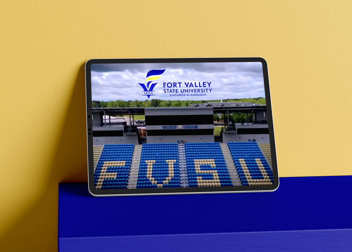 Tablet displaying opening of Fort Valley State University campus video